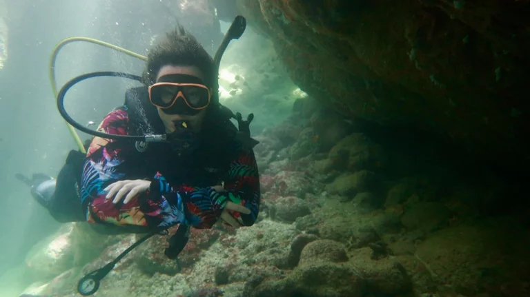 Cavern diving in Cuba with light entering underwater cave