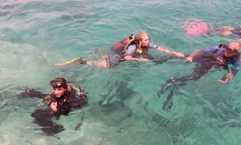 Dive instructor guiding beginners at Coral Beach, Varadero